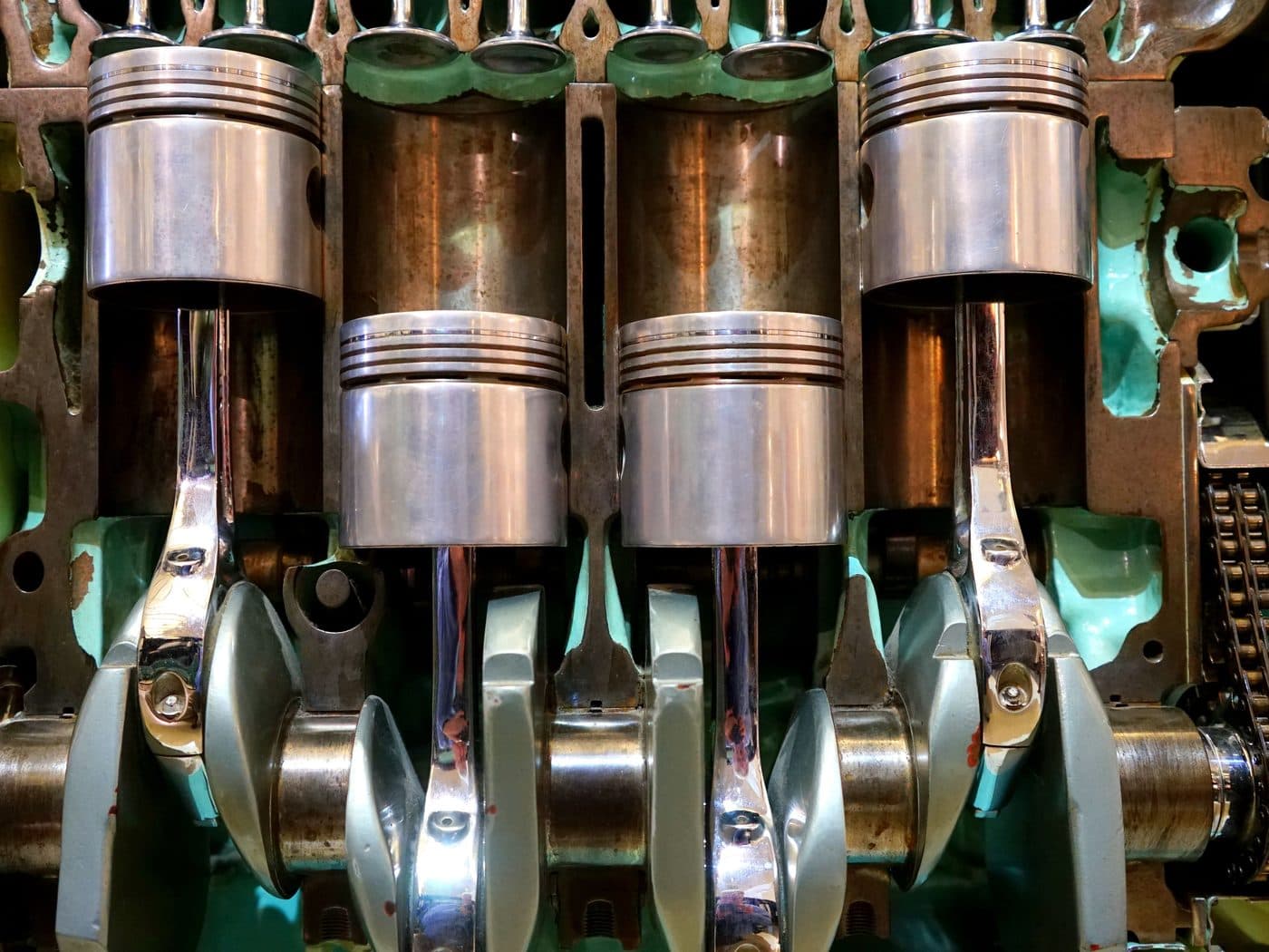 A crankshaft with its pistons and connecting rods — the rotating assembly that gets balanced